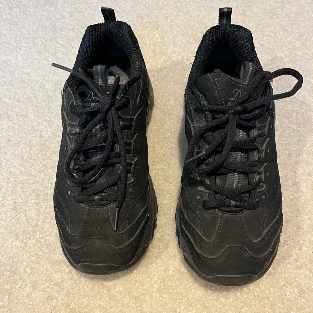 Black Skechers sneakers